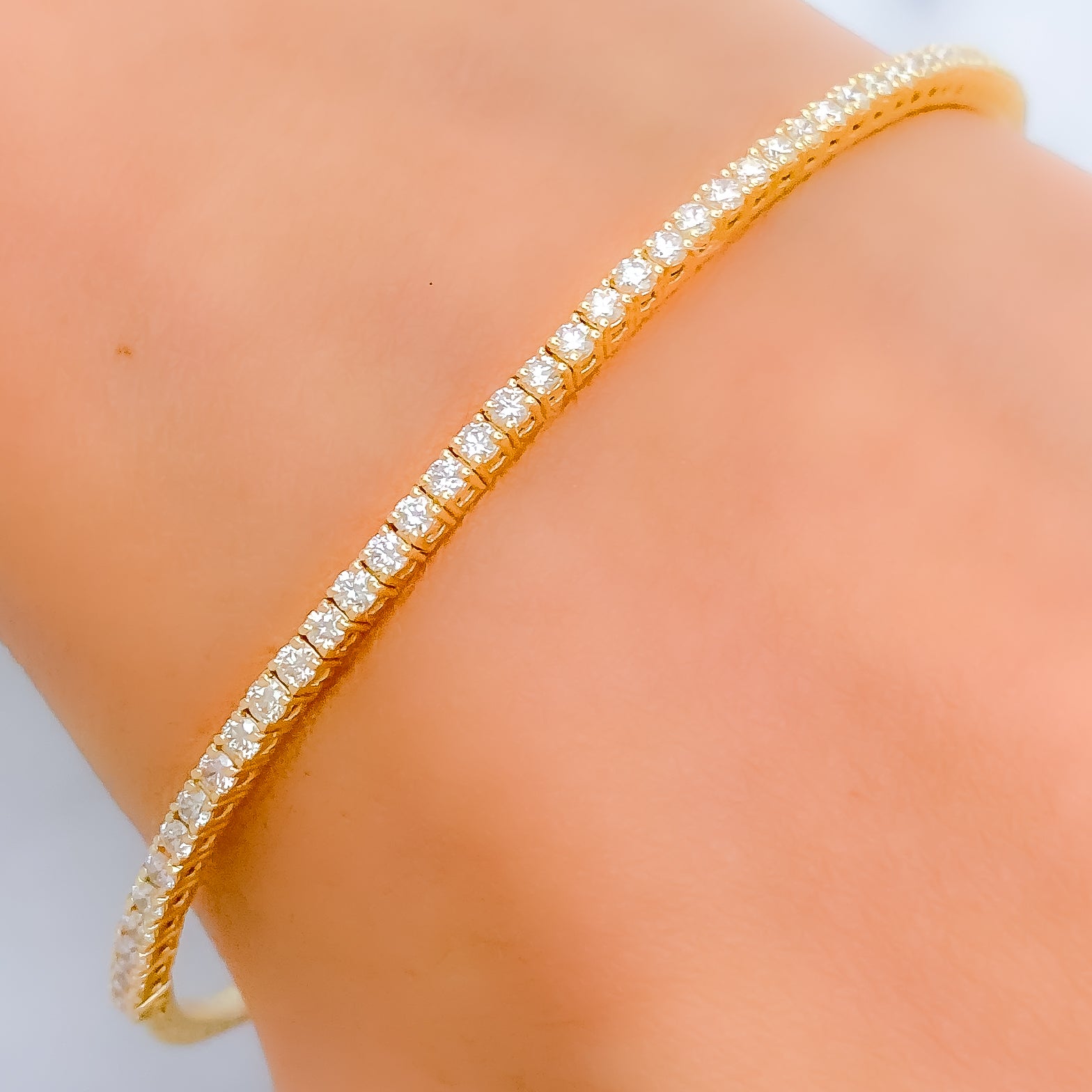 14K Yellow Gold Princess And Baguette Cut Diamond Bow Bracelet (5 3/4 –  Tuesday Morning